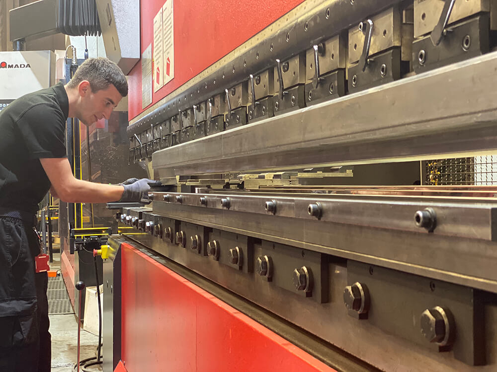 Press brake operator NpfM0hVASc6lLlcsDS21ww Boss Cabins We Mean